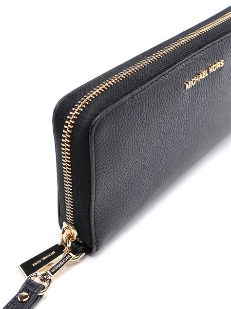 michael kors jet set signature travel continental multifunction wallet|Michael Kors silver metallic wallet.